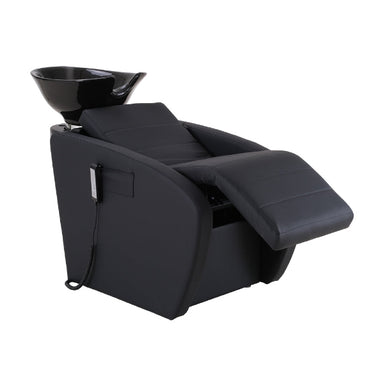 Angled view of the Karma Daylesford heating and massage shampoo station with reclining seat and professional hair wash basin