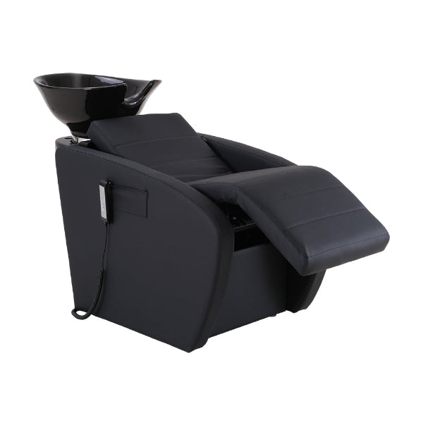 Angled view of the Karma Daylesford heating and massage shampoo station with reclining seat and professional hair wash basin