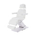 White Karma Dunedin electric beauty bed with padded headrest cushion and adjustable height