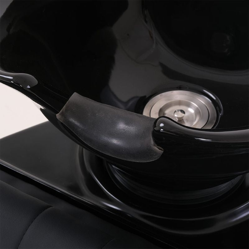 Interior of the Karma Flemington shampoo basin featuring a comfortable neck rest and stainless steel drain