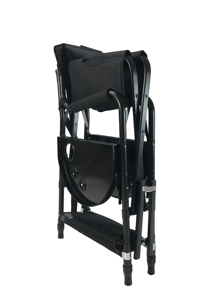 Rear view of folded makeup chair with carry bag