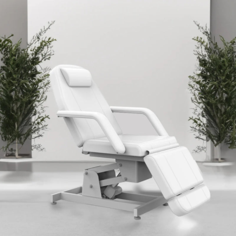 Professional white electric beauty bed styled in a modern salon environment with plants