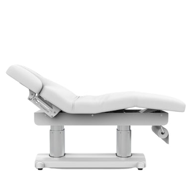 White Karma Hunterville electric beauty bed in a flat horizontal position showing the dual column base