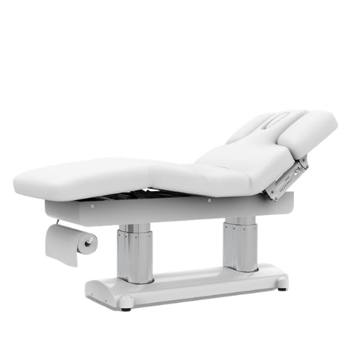Side profile of the beauty bed highlighting the integrated paper roll holder for sanitary treatment setup