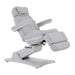 White Karma Inglewood beauty bed in a semi-reclined position for facial and aesthetic treatments