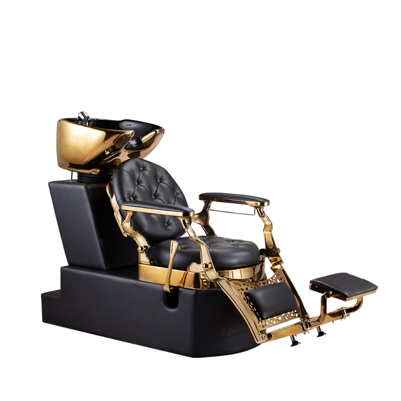 Side view of Karma King Valley luxury shampoo station with gold basin and black tufted upholstery