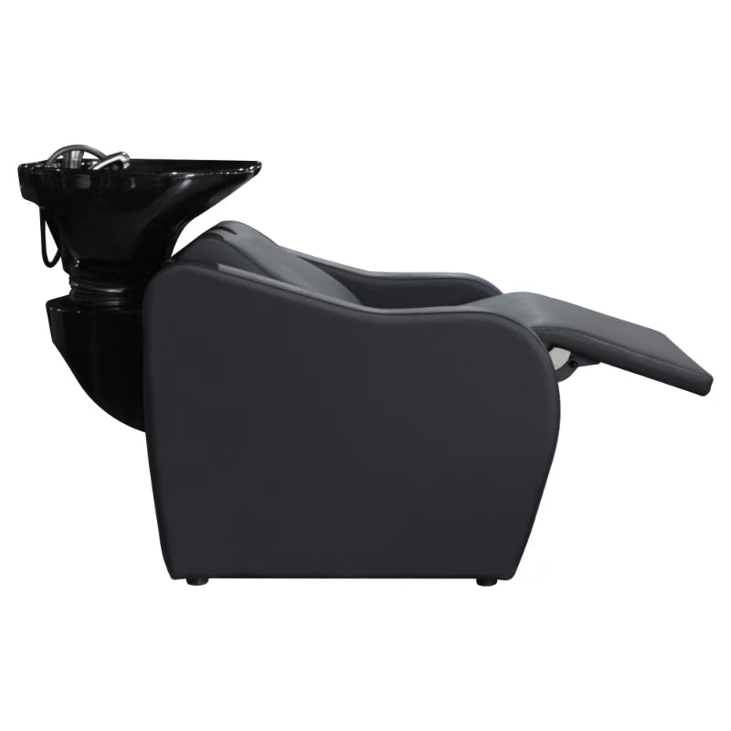 Side profile of the Karma Mosman shampoo unit showing the electric reclining function and extended leg rest