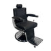 Angled view of the Karma Mt Isa barber chair showing the stitched vinyl upholstery