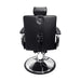 Rear view of the Karma Mt Isa barber chair showing the headrest adjustment and chrome accents