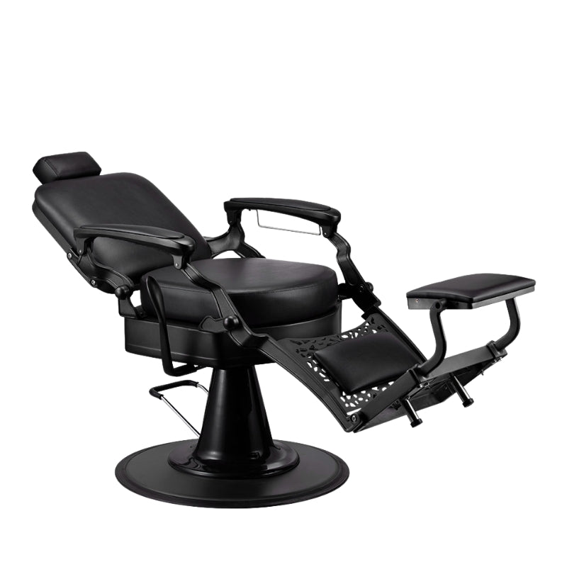 All black professional barber chair in a reclined position for shaving