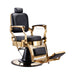 Luxury black and gold Karma Noosa barber chair with ornate gold metal frame