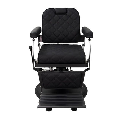 Front view of black professional barber chair showing padded armrests and footrest