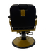 Back of Karma Paddington chair showing gold hydraulic base and headrest detail