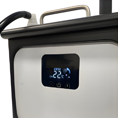 Close up of the Karma Portable Hair Spa digital control panel showing temperature settings and heating unit
