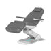 Electric beauty treatment chair in a lowered position for easy client access