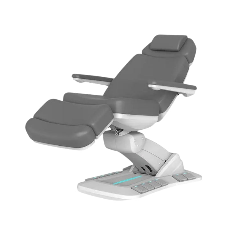 Electric beauty treatment chair in a lowered position for easy client access