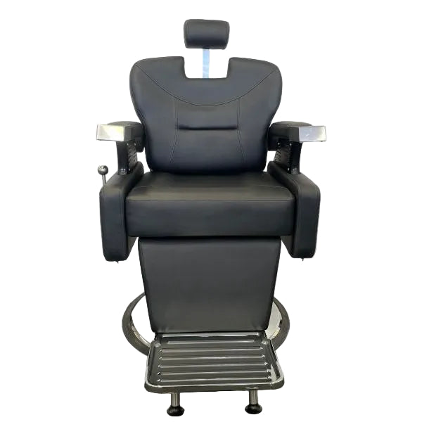 Front view of the Karma Runcorn black barber chair showing the wide seat and adjustable headrest