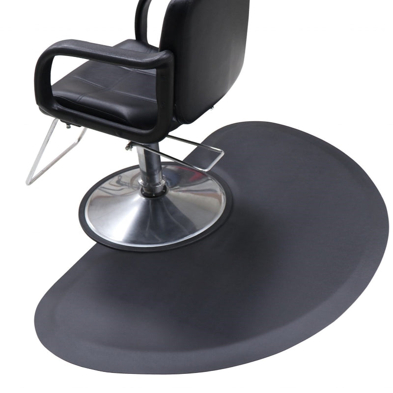 Close up of the Karma hairdressing mat showing the semi-circle cutout designed for round base salon chairs
