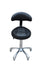 Black ergonomic salon stool with raised padded seat and aluminium base