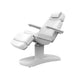 Side view of the Karma Stratford white electric beauty bed in a semi-reclined position for clinical treatments