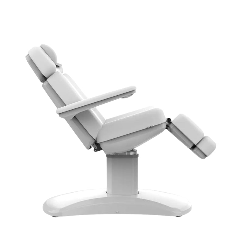 Karma Stratford electric spa bed fully reclined with white antimicrobial upholstery for beauty salons