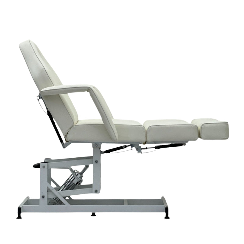 Karma Taupo white treatment bed showing the horizontal leg extension and straight profile