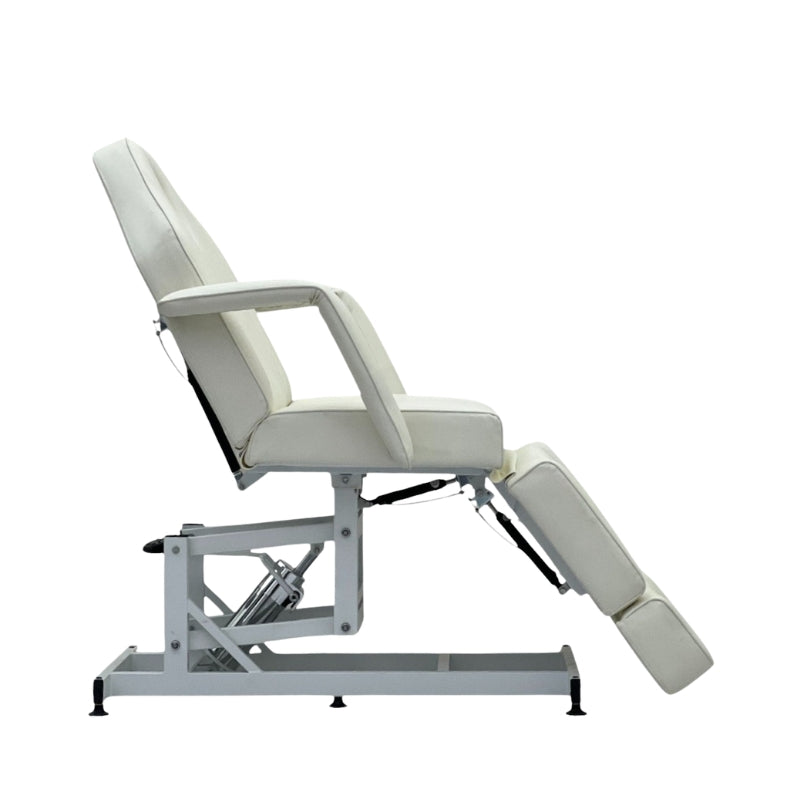 Side view of the white Karma Taupo hydraulic bed with the leg section adjusted downwards