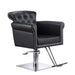 Front view of the Karma Thredbo black tufted salon chair with stud detailing and hydraulic base