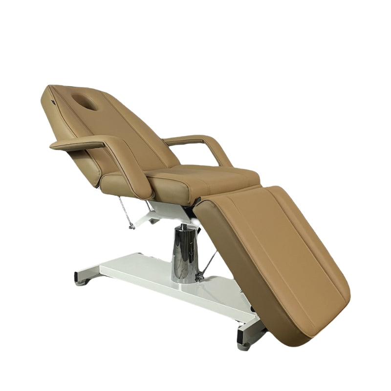 Sand coloured Karma Wellington hydraulic beauty bed in a seated position for salon use