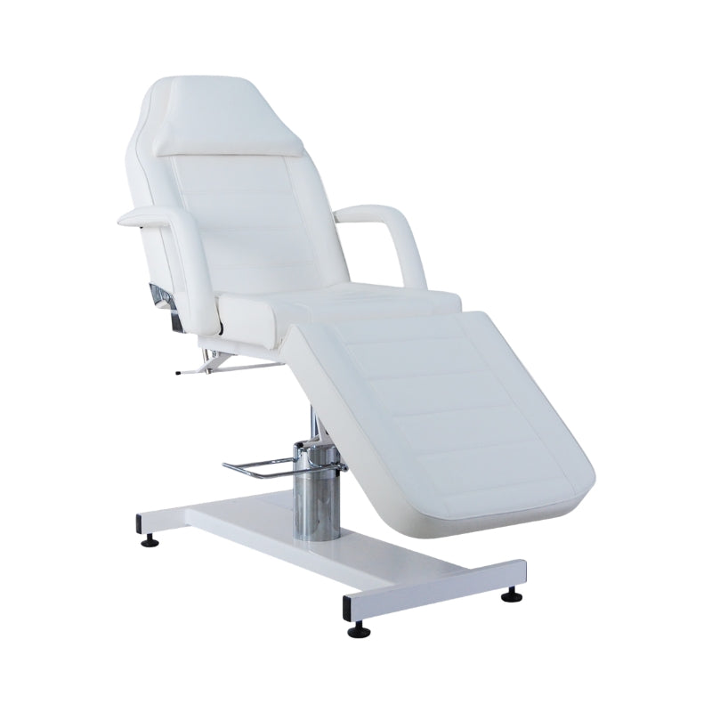Karma Wellington white hydraulic beauty bed in an upright seated position with armrests