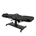 Professional black hydraulic tattoo bed in flat position with face hole and removable pillow