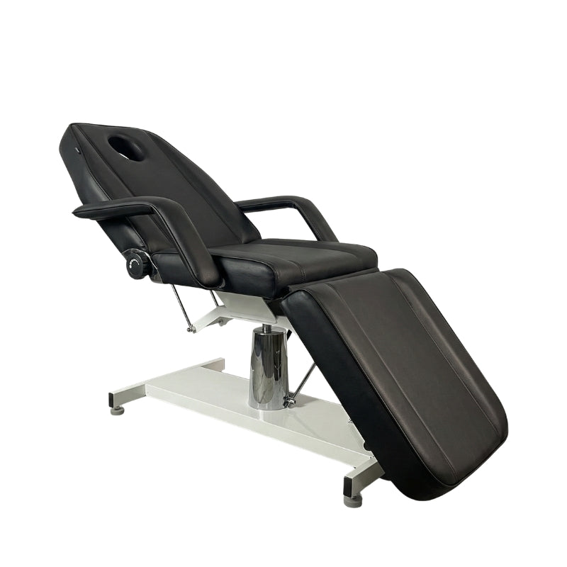 Black Karma Wellington hydraulic tattoo bed with 360 degree swivel base and adjustable leg rest