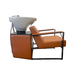 Side profile of the Karma Wodonga shampoo station featuring tan vinyl upholstery and ergonomic seating