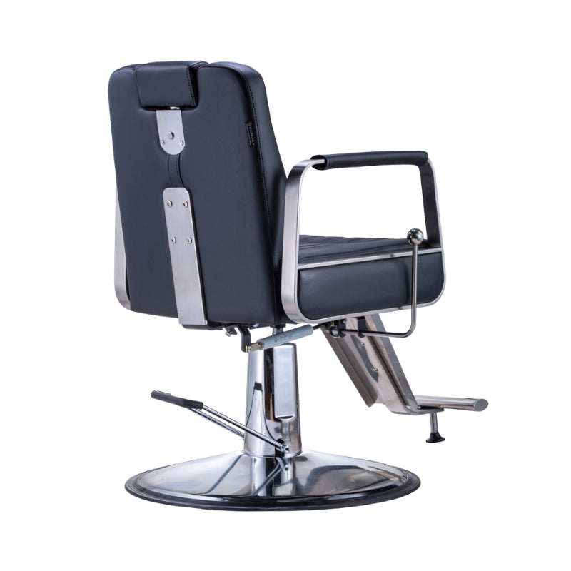 Rear view of the Karma Wollongong salon chair showing metal supports and black vinyl finish