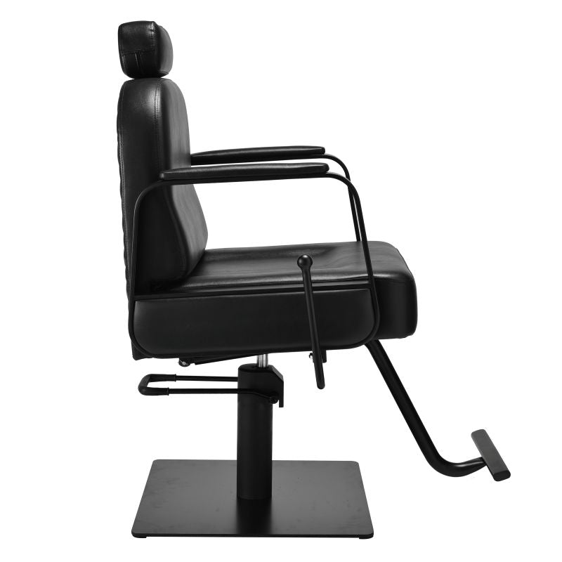 Side view of black reclining beauty styling chair