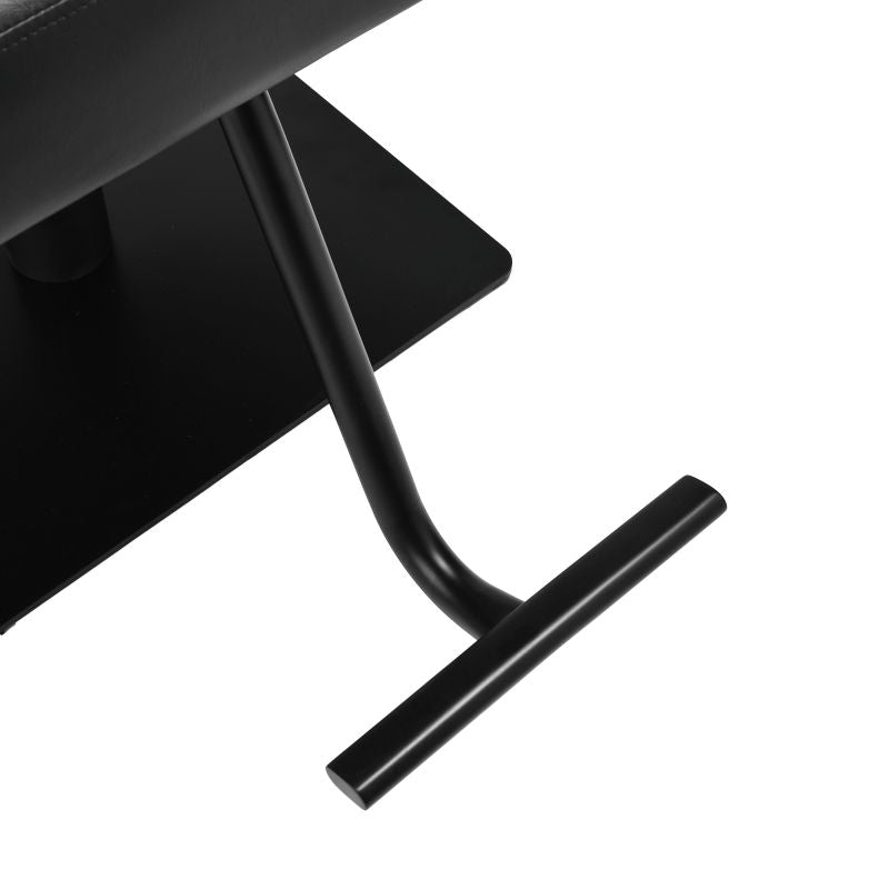 Adjustable footrest on reclining salon styling chair