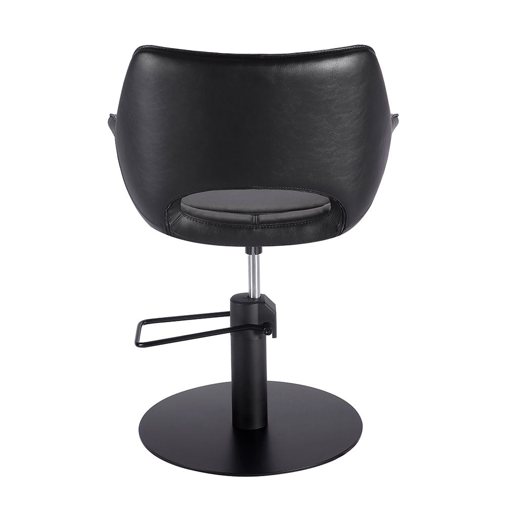 Black professional styling chair side profile with padded armrests
