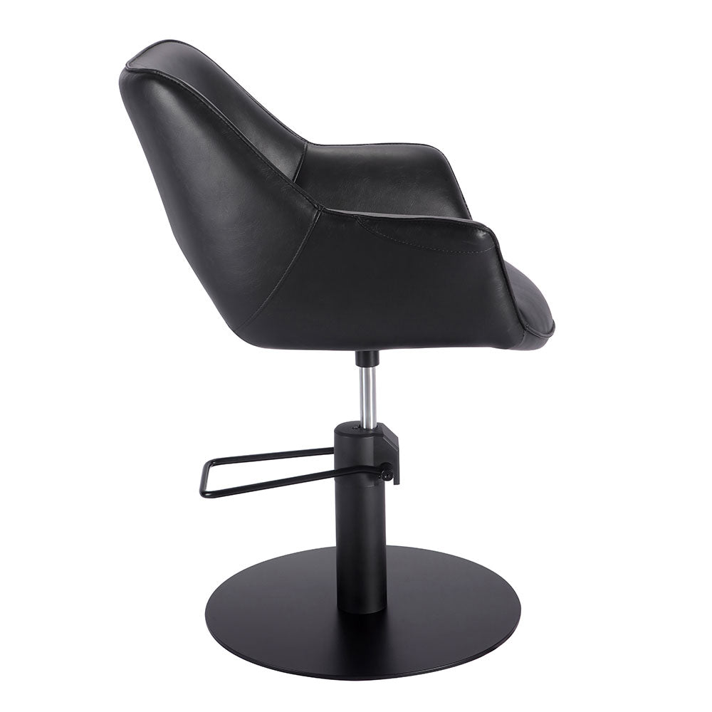 Black salon styling chair front view with ergonomic seat design