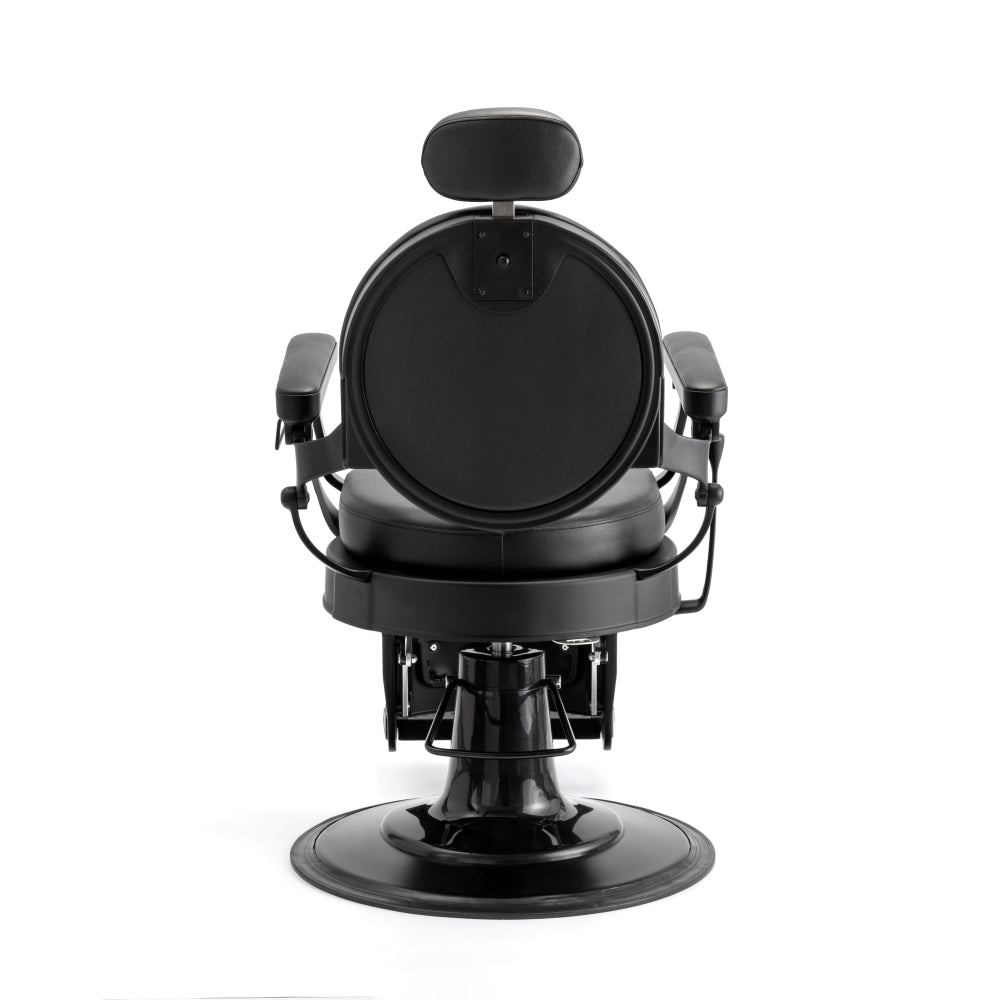Rear view of professional black barber chair with disc base