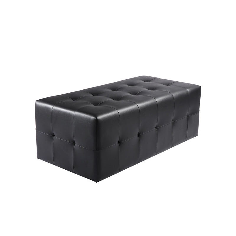 Angled view of black medium ottoman suitable for barbershops
