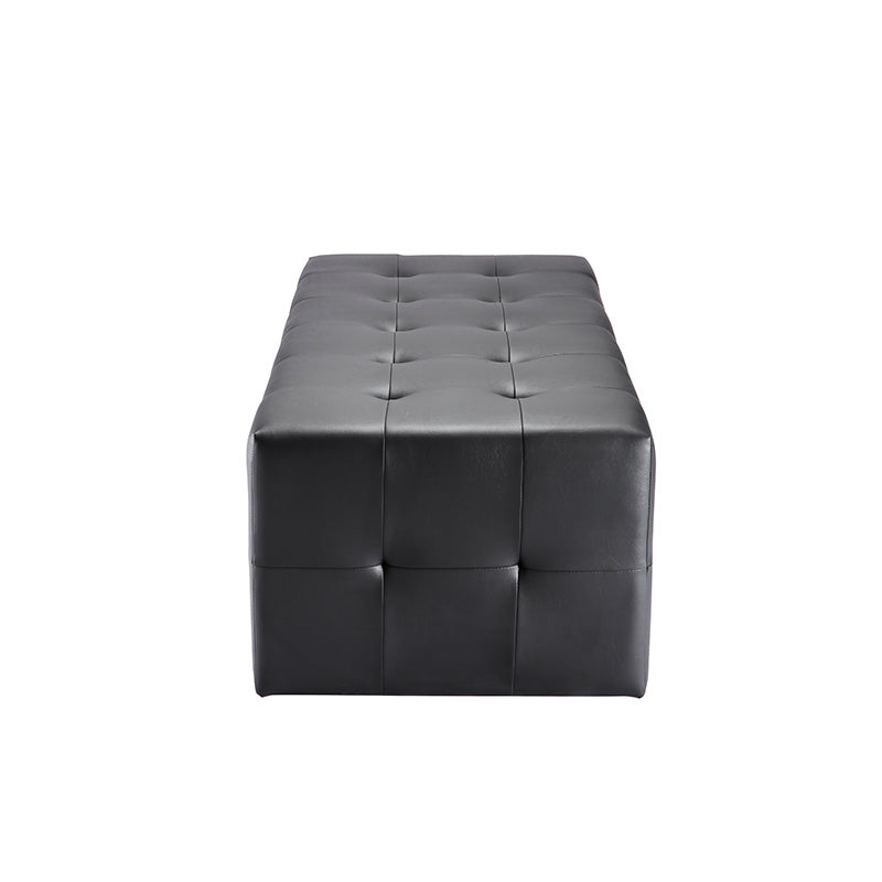 Side profile of black vinyl ottoman designed for professional salons