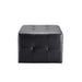 Black small salon ottoman upholstered in commercial-grade vinyl