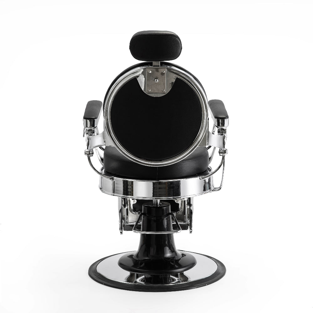 Rear view of professional black barber chair with headrest