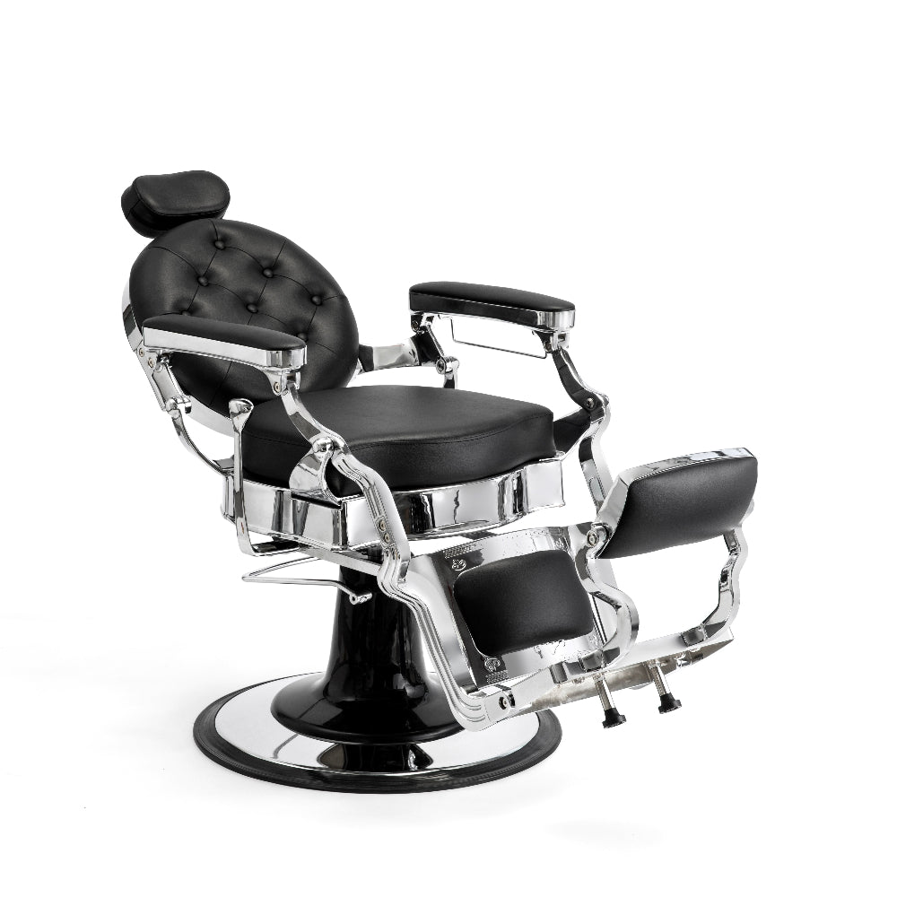 Professional barber chair in reclined position with adjustable footrest