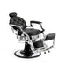 Professional barber chair in reclined position with adjustable footrest