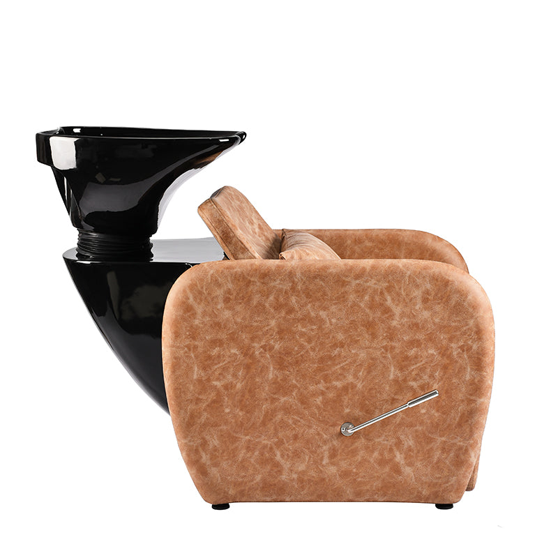 Side angle of Violeta shampoo unit showing ergonomic seat design