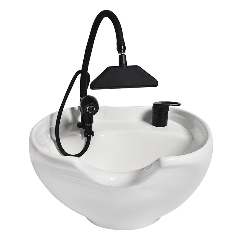 waterfall headspa delivering a calming scalp treatment at a salon shampoo basin